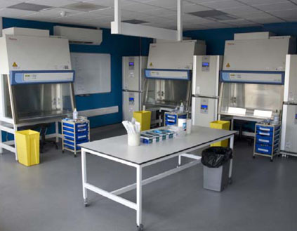 View of demonstrator fume cupboard and colour-coded waste bins