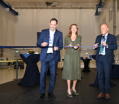 Formal ribbon cutting by Marco Massaro, Head of ESA’s Estates and Facilities Management Division; Paulien van Essen, Regional Manager of lead builder Heijmans and Torben Henriksen, Head of ESTEC and ESA Director of Technology, Engineering and Quality. Image credit: ESA