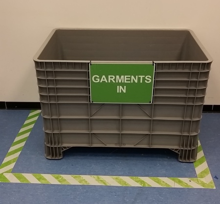 Central incoming and outgoing garment storage areas should be clearly defined