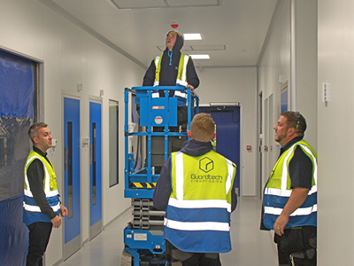 Conor Barwise, far left, and the Installation team onsite at a major 600sqm turnkey construction build. Image: Guardtech Cleanrooms LTD