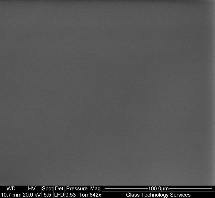 SEM image showing bulk glass on vial sidewall without any sign of surface attack