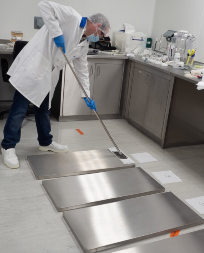 Picture 4: Application of disinfectant via mopping on stainless steel panels
