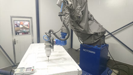 Contained robot boosts MechCaL's fan production 