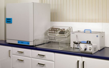 Integrated cleaning system with a small footprint