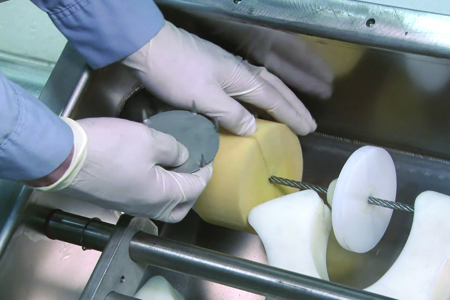 Sanitary tubular cable conveyor prevents product and plant contamination