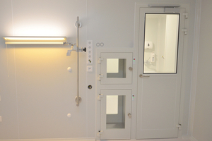 What distinguishes a cleanroom from a sterile environment?